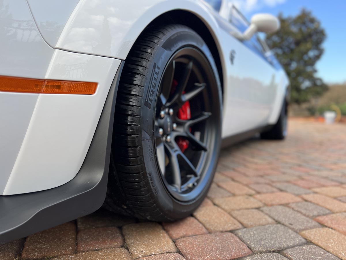 Wheel and tire of muscle car after cleaning and dressing